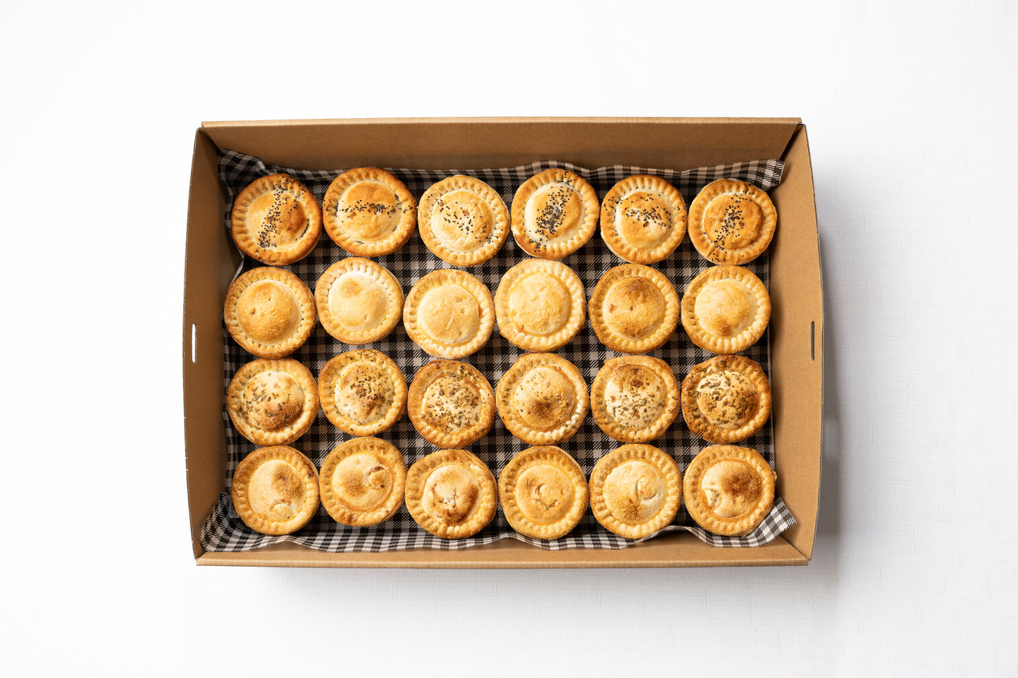 A box of 24 gourmet cocktail pies in a variety of flavours