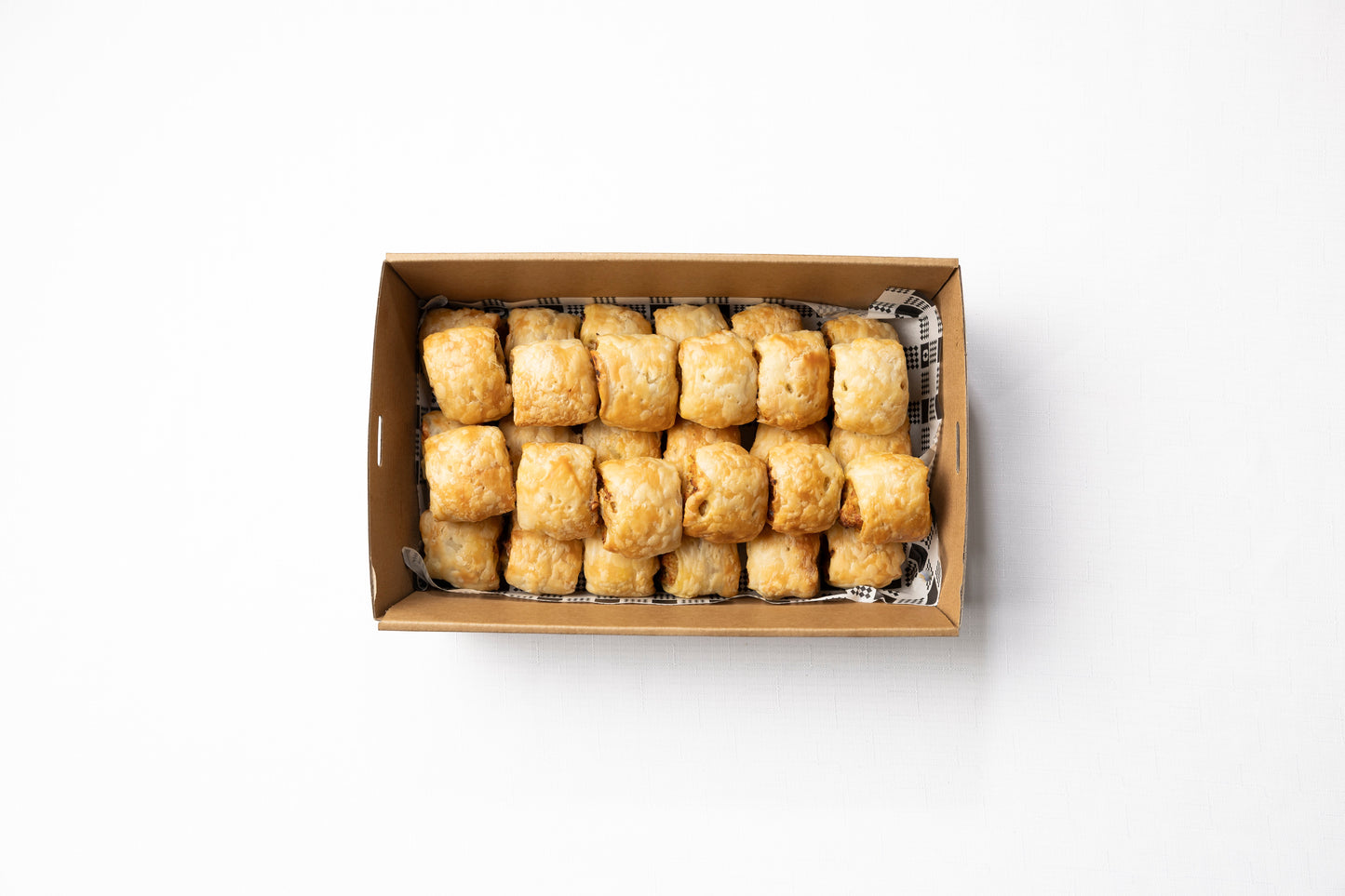 A box of 30 homemade cocktail sausage rolls